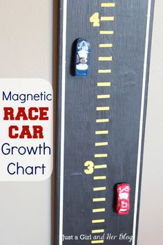 a wooden growth chart with cars on it and the words magnetic race car growth chart