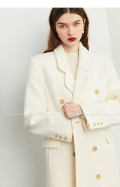 The Tuoo coat offers chic sophistication with its minimalist cream and white color palette for a high-end luxurious look. Crafted from wool, this timeless, elegant coat provides the perfect blend of sophistication, modern yet timeless style and chic comfort. Perfect for any season, this chic design is both stylish and trendy. Cream Notch Lapel Outerwear For Winter, Elegant Cream Wool Coat For Business, Cream Wool Coat For Business In Winter, Winter Business Cream Wool Coat, Winter Cream Single Breasted Wool Coat, Business Cream Wool Coat, Cream Winter Business Outerwear, Elegant Cream Wool Coat With Notch Lapel, Elegant Cream Wool Blazer