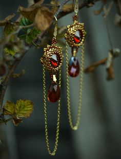 Red and gold braided earrings - seed bead beadwork jewelry - swarovski earrings - gold filled chain- delica seed beads Elegant Red Teardrop Beaded Earrings, Gold Beaded Earrings With Bead Caps As Gift, Gold Beaded Earrings With Bead Caps For Gift, Red Dangle Jewelry With Bead Caps, Elegant Red Earrings With Gold Beads, Gift Red Beaded Earrings With Bead Caps, Elegant Festive Earrings With Beaded Chain, Elegant Beaded Chain Earrings As Gift, Elegant Beaded Chain Earrings For Gift