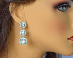 "Get the look of real diamonds at fraction of the cost! These AAA Cubic Zirconia Earrings have an elegance and classic appeal to them. They remind one of the timeless Victorian era where everything was so simple and elegant. They are made with very high quality components, have an expensive look and a brilliant sparkle; making them perfect for weddings and special occasions. They are about 1 3/4\" from top of the ear post to the bottom of the square pendants. All components are luster rhodium pl Expensive Look, Yellow Jewelry, Sunflower Earrings, Yellow Earrings, Cubic Zirconia Earrings, Square Pendant, Swarovski Crystal Earrings, Zirconia Earrings, Earrings Wedding