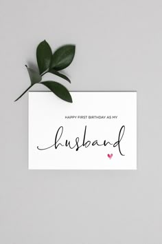 a card with the words husband written in cursive writing and a leaf on top