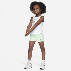 This 2-piece set will make your little athlete a happy camper. Both pieces are made of poly knit fabric enhanced with quick-drying, moisture-wicking Dri-FIT technology to help keep little ones cool and dry while they play. The roomy A-line tank has snappy tape closures at the racerback for easy dressing. The matching shorts are breathable mesh with a stretchy waistband for a comfy fit. Nike Casual Activewear For Outdoor Activities, Playful Summer Activewear For Gym, Casual Nike Activewear For Outdoor Activities, Playful Summer Gym Activewear, Playful Summer Activewear, Sporty Athletic Shorts For Spring Outdoor Activities, Sporty Athletic Shorts For Spring, Nike Green Activewear For Outdoor, White Activewear For Outdoor Activities In Spring