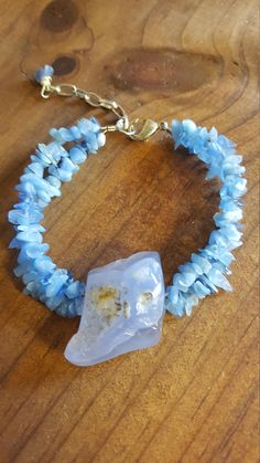 This Chalcedony healing gemstone bracelet is stunning. It brings positive vibes and diminished negative thinking. It measures 7 inch with 2 inch extender and lobster clasp to adjust size. One size fits most. Comes in linen pouch with artist card. Blue Lace Agate Bracelet, Linen Pouch, Healing Gemstone Bracelets, Artist Card, Neighbor Gifts, Happy Vibes, Agate Bracelet, Blue Lace Agate, Blue Chalcedony