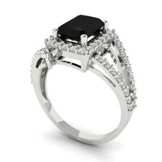 a black and white diamond ring on a white background