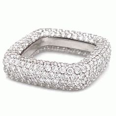 a white gold and diamond ring with two rows of diamonds on the inside of it