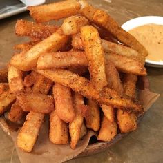 french fries with dipping sauce on the side