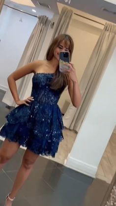 one shoulder navy blue appliques A-line tiered ruffle short homecoming dress party dress #homecomingdress #homecoming2024 #hocodress #winterformal2025 #graduationdress #partydress #winterformaldress #fallball #balldress #highschoolball #juniorpromdress #pageantdress #cocktaildress #minidress #partydress #sweet16dress #birthdaydress #concertoutfit Blue Strapless Ruffled Party Dress, Blue Ruffled Strapless Party Dress, Blue Tiered Party Dress, Blue Strapless Ruffle Dress For Prom, Blue Strapless Ruffled Dress For Prom, Blue Strapless Dress With Ruffles For Prom, Sequin Ruffle Dress For Prom, Winter Formal Dresses, Junior Prom Dresses