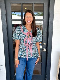 Get ready to turn heads in The Callum Top! This cute floral print top features short puff sleeves, a large collar, and adorable bows on the front. Perfect for any casual occasion, this top will add a touch of charm and playfulness to any outfit. Don't miss out on this lovely addition to your wardrobe! Chelsea is wearing a size Large. Height is 5’8, Bust is 36”, Waist 28” - 29”, and Hips 42”. Vintage Havana, Top Graphic Tees, Floral Print Tops, Sweater Set, Mens Outerwear, New Arrival Dress, Dress Romper, Mens Graphic Tee, Print Top