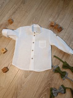 Baby long sleeve linen shirt. The shirt is with wooden buttons and one small pocket on breast. Linen Long Sleeve Shirt With Button Closure, White Long Sleeve Buttoned Shirt, White Long Sleeve Shirt With Buttons, Baby Boy Shirts, Boys Tops, Boy Shirt, Wooden Buttons, Baby Long Sleeve, Boys Shirts