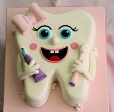 there is a cake made to look like a tooth