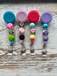 Silicone Beaded Badge Reel. Show your individual style with these super cute beaded badge reels.   Silicone beads are lightweight, BPA free and easy to clean.   Alligator Swivel Clip. Adjustable Multicolor Retractable Badge Reel, Multicolor Retractable Badge Reel For Gift, Adjustable Retractable Multicolor Badge Reel, Multicolor Retractable Badge Reel, Fun Multicolor Adjustable Badge Holders, Adjustable Multicolor Badge Reel For Gifts, Adjustable Multicolor Badge Reel For Gift, Multicolor Beaded Badge Reel As Gift, Silicone Bead Badge Reel