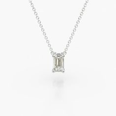 14K White Gold Emerald Cut Diamond Solitaire Pendant (0.25 CTW - H-I / SI1-SI2). This light four prong wire basket is designed to showcase the unique characteristics of an emerald cut diamond. This lovely solitaire pendant is attached to an 18 cable link chain. Truly a classic design that is perfect for any occasion. Refined White Gold Solitaire Necklace With Single Cut Diamonds, Classic White Gold Solitaire Necklace With Radiant Cut, Classic Radiant Cut Solitaire Necklace In White Gold, Classic White Gold Radiant Cut Solitaire Necklace, Classic White Solitaire Necklace For Everyday Luxury, White Gold Solitaire Necklace With Radiant Cut Diamond, Radiant Cut Solitaire Necklace In White Gold, White Gold Solitaire Necklace With Emerald Cut Diamond Accents, White Emerald Cut Diamond Necklace For Formal Occasion