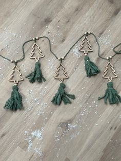 small christmas tree ornaments on a wooden floor