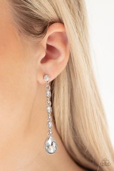 Dainty white marquise rhinestone frames drip from a classic white rhinestone fitting. An oversized teardrop rhinestone swings from the bottom for a dramatic finish. Earring attaches to a standard post fitting. Sold as one pair of post earrings. P5PO-WTXX-242XX Paparazzi Accessories Jewelry, Pink Jewels, Earrings Trendy, Jewelry Images, Paparazzi Accessories, White Rhinestone, Chic Jewelry, Paparazzi Jewelry, White Earrings