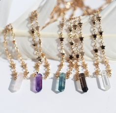 Elevate your style with the cutest mini crystal point necklace. Perfect for layering, featuring small crystal of your choice on a star chain choker. Crystal is wire wrapped and suspended in the middle of stainless steel or gold tone stainless steel tiny star link chain.   You get to pick your crystal: 💜Amethyst- Calming 🤍Crystal Quartz- Purifying 💗Rose Quartz- Loving 🖤Smoky Quartz- Grounding Rainbow Fluorite- Empowering Necklace is intended to fit like a lose choker and is adjustable at 14 inches long with a 3 inch extender chain, so can be worn at any length between 14 and 17 inches.  Every order item purchased arrives in a lovely little gift box. 😘 Thanks for stopping by! ❤️ xoxo, Amy *We at Buddha Blossom Jewels believe in the power of intention and harnessing specific energies wit Grounding Crystals, Star Choker, Crystal Vibes, Crystal Point Necklace, Crystal Amethyst, Necklace Star, Crystal Goddess, Crystal Pendants, Crystal Fashion