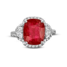 Step into a world of opulence with the Cushion Ruby Half-Moon Diamond Halo Ring, a resplendent masterpiece that exudes regal elegance. At the heart of this exquisite piece lies a majestic cushion cut ruby, a gemstone revered for its deep, passionate red hue. Flanking the ruby on each side are half-moon diamonds and a halo of round brilliant cut diamonds, adding the perfect touch of sparkle. Luxury Ruby Gemstone Ring In Platinum, Luxury Gia Certified Cushion Cut Ruby Ring, Luxury Red Cushion Cut Ruby Ring, Cushion Cut Diamond Gemstones For Fine Jewelry, Gia Certified Cushion Cut Ruby Ring For Formal Occasions, Cushion Cut Diamond Fine Jewelry, Formal Gia Certified Cushion Cut Ruby Ring, Luxury Cushion Cut Gemstones For Wedding, Luxury Lab-created Ruby Ring