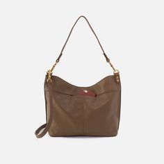 This bag pairs style and function effortlessly, converting from a shoulder bag to crossbody for two looks in one. Pier Shoulder Bag In Pebbled Leather  Dark Elm SHOULDER in Dark Elm | Hobo® Leather Shoulder Bag With Gold-tone Hardware For On-the-go, Leather Hobo Bag With Removable Pouch For On-the-go, Pebbled Leather Crossbody Shoulder Bag For On-the-go, Double Handle Pebbled Leather Shoulder Bag For On-the-go, Versatile Textured Leather Shoulder Bag For Work, Textured Leather Hobo Shoulder Bag For Daily Use, Textured Leather Hobo Shoulder Bag For Work, Brown Pebbled Leather Hobo Bag For Everyday, Textured Leather Crossbody Bucket Bag For Work