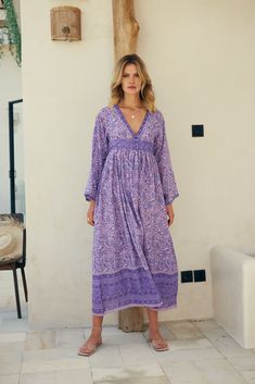 Jade Printed Maxi dress is perfect for beach-to-bar occasions. Some of our favorite touches, sophisticated and graceful design, make this dress an instant Blue Boheme classic.Color: Lavender Sizes: Small/Medium, Fits Size 2 to 6 and Medium/Large, Fits Size 6 to 10 100% Indian Cotton With a Lining Made in India Model Height: 5'7Bust: 32BWaist: 24Hips: 32 Feminine Long Dress For Beach, Feminine Floor-length Beach Maxi Dress, Feminine Boho Maxi Dress For Vacation, Elegant Purple Summer Maxi Dress, Feminine Floor-length Beach Midi Dress, Spring Lavender Flowy Midi Dress, Bohemian Maxi Beach Dress For Daywear, Chic Purple Maxi Dress For Vacation, Chic Purple Floor-length Maxi Dress