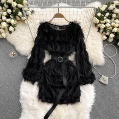 Cute A line tassel long sleeve dress fashion dressFabric: blendedColor: black, whiteSize(cm): free size(1inch=2.54cm)length 78cm bust 110cm waist 100cm sleeve length 55cmPlease check the size carefully when you choose items.For more pictures of the dress, please contact us, thank you. Long Sleeve Mini Dress With Fringe For Party, Elegant Long-sleeved Dress With Tassels, Elegant Long Sleeve Dress With Tassels, Trendy Long Sleeve Dress For Fall Party, Long Sleeve Mini Dress With Tassels, Long Sleeve Dresses With Tassels For Night Out, Elegant Long Sleeve Dress With Fringe, Elegant Long Sleeve Fringe Dress, Long Sleeve Dresses With Tassels