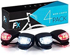 three bicycle lights are shown in front of a box