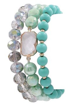 Stack of three beaded stretch bracelets in coordinating colors of mint. Wear them together or alone. Measurements: Stretch *All Jewelry is Final Sale* Boutique Warehouse, Faceted Bead Bracelet, Gold Wrap, Printed Handbags, Chunky Beads, Crown Jewels, Coordinating Colors, Beaded Stretch Bracelet, Accessories Bracelets