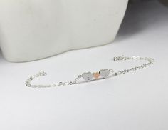 "A beautiful rose mix two silver heart bracelet ,A must have ! This impressive couples bracelet is features 2 initials of your choice . It is simple and dainty. Such a nice way to let someone know you are loved! it's so easy to stack with other bracelet too.Great present for best friends, couples or parents, wife, girlfriend and brides.everyday necklace,two sisters , mom of twins, his and her... Both Gold And Silver Available !! ** Sterling Silver chain and clasp **Adorable bead heart features e Silver Heart Bracelets For Best Friend Gift, Heart-shaped Silver Bracelets For Best Friend Gift, Silver Bracelets With Initials For Valentine's Day, Elegant Heart-shaped Bracelets For Best Friend, Minimalist Double Heart Bracelet For Anniversary, Delicate Silver Bracelets With Heart Charm, Rose Gold Heart Charm Bracelet For Friendship, Silver Heart Bracelet For Best Friend On Mother's Day, Silver Heart Bracelet For Best Friend On Valentine's Day