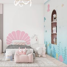 a child's bedroom decorated in pastel pink and blue with mermaid themed decor