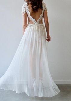 The Evis Skirt - SAMPLE SALE is the perfect, romantic overlay for our Evis Bodysuit. Light, flowy and feminine. Dry clean only.Size: 10 - IN EXCELLENT CONDITION.Can also be order Made to Measurements for full price $699.95*.*please allow 16-18 weeks for your gown to be made and posted. It will also be sold at full price + Postage. **Please be advised we do not make to length. All gowns are made to a standard length, and it is your responsibility to hem accordingly. International Delivery (15 - 2 Summer Wedding Gown With Sheer Bodice, Sheer Bodice Backless Wedding Dress, Summer Wedding Gown With Lace Bodice, Summer Wedding Dress In Tulle, Sheer Flowy Floor-length Gown, Spring Wedding Full Length Skirt, Floor-length Sheer Flowy Gown, Sheer Chiffon Floor-length Gown, Sheer Full Length Wedding Dress