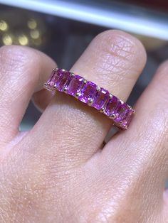 This item is made to order and takes 4-6 Weeks to complete. Material Gemstone: Diamond, Gold Description Up for sale is a beautiful 18K Gold Pink Sapphire Radiant Eternity Band.Radiant Pink Sapphire weight is 7.50 carats.Color Pink SapphireSpecifications:-Model #: DHODPSET-Metal Type: White, Yellow, and Rose Gold-Metal Purity: 18K-Total Diamond Weight: 7.50 Total carats Pink Sapphire-Color: Pink Sapphire-Clarity: SI Brief Overview:-Free Sizing W/ Purchase-14 Day Return Policy-Conflict Free Diamo Pink Wedding Band, Gold Diamond Eternity Band, Pink Sapphire Band, Emerald Eternity Band, Teeth Jewelry, Rainbow Sapphires, Sapphire Band, Diamond Eternity Band, Multi Sapphire