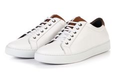 Elevate your sneaker game with low-top sneakers, made from the finest Italian calfskin leather with extra padding for exceptional comfort and support. Make these your weekend warrior. Runs true to size. For example, if you normally wear a size 10 sneaker, order a size 10 Full-grain Italian calfskin leather Black interior leather lining Painted by hand Handmade in Italy Luxury Leather Sneakers With Vulcanized Sole, Luxury Custom Sneakers With Vulcanized Sole, Paul Smith Shoes, Italian Sneakers, White Sneakers Outfit, Paul Evans, The Smith, Naples Italy, Weekend Warrior