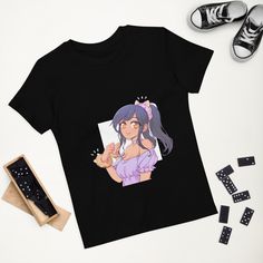 Dress your Aphmau fan in a t-shirt that's cute, super comfortable, and made of natural fabrics! This 100% organic cotton tee is sure to become their favourite Aphmau Merch. 100% Organic Cotton. Cute Custom Print T-shirt For Streetwear, Black Kawaii T-shirt With Funny Print, Trendy Cotton T-shirt With Anime Print, Purple Short Sleeve Kawaii T-shirt, Purple Kawaii Short Sleeve T-shirt, Purple Graphic Print Kawaii T-shirt, Cute Cotton T-shirt With Anime Print, Kawaii Purple T-shirt With Graphic Print, Purple Kawaii T-shirt With Graphic Print