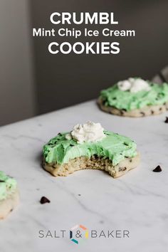 three cookies with green frosting and chocolate chips on top that have been cut in half to look like crumbl mint chip ice cream cookies