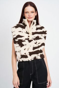 Get mooooving in this quirky cow print vest! Made with fuzzy fabric, it's perfect for adding a touch of fun to any outfit. Don't be afraid to show your wild side with this playful piece. (Pun intended!) Model is 5'9" wearing a size small. Fabric Contents: 100% Polyester Cow Print Vest, Brown Cow, Casual Evening, Kimono Dress, Print Pullover, Cow Print, Outerwear Women, Easy Wear, Button Placket