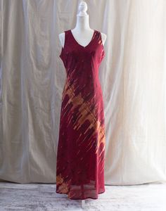 "Vintage 1990s abstract print maxi dress Red abstract print Made by Positive Attitude Petite in USA 100% polyester Dry clean Fully lined Size 12; see measurements below Minor wear and fading Bust: 36 3/4\" Waist: 33\" Hip: 40\" Sweep: 69\" Length from high point shoulder: 54\" All vintage items are unique and in good condition.  Due to age, previous love, and wear flaws are to be expected.  We do our best at What Not Vintage Shop to describe all items including flaws.  All sales are final.  Plea Red Abstract Print Maxi Dress For Summer, Red Abstract Print Summer Maxi Dress, Summer Red Maxi Dress With Abstract Print, Spring Red Maxi Dress With Abstract Print, Red Maxi Dress With Abstract Print For Spring, Red Maxi Length Dress With Abstract Print, Red Maxi Dress With Abstract Print, Red Sleeveless Bias-cut Maxi Dress, Red Sleeveless Maxi Dress With Bias Cut