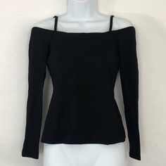 L'agence Off The Shoulder Top With Straps Condition: Nwt Size: Xs Color: Black Features: Off Shoulder, Fitted, Zipper Back, Has Spaghetti Straps, Very Figure Flattering, Has Stretch This Is A Perfect Day To Night, Versatile Top No Fabric Care Tag - This Is A Sample Piece Approximate Measurements Taken While Lying Flat: Pit To Pit: 14" Length: 21" (Taken From Top Of Strap) Fitted Off-shoulder Top For Brunch, Solid Fitted Tops For Brunch, Fitted Tops For Brunch, Fitted Off-shoulder Top For Date Night, Fitted Solid Tops For Brunch, Sleek Black Slim Fit Tops, Sleek Fitted Tops For Date Night, Sleek Tops For Date Night In Spring, Fitted Black Top For Brunch