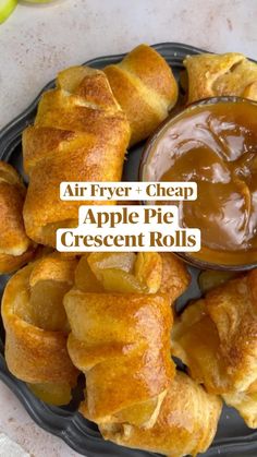 an apple pie crescent rolls with caramel sauce on top and the words, air fryer cheap apple pie crescent rolls