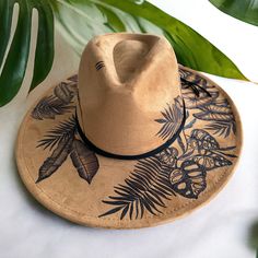 This Hat is Burned using Pyrography Techniques. Each Hat burned is drawn freehand therefore each one is a ONE of a KIND. Hats are all sprayed for weather and wear. Each Hat comes with a handcrafted Macrame Wall Hanger & a Signature Dust/Travel Bag. Cheap Personalized Curved Brim Hats, Pyrography Hats, Burning Hats, Hat Burning, Macrame Wall Hanger, Hat Day, Pyrography Art, Boho Hat, Velvet Hat