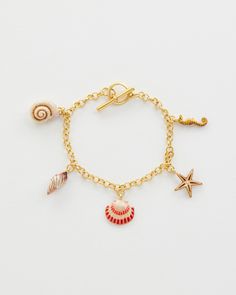 Key Features:



Whispering Sands Inspiration: Embrace the essence of our Whispering Sands collection with the Hand Painted Shell Charm Bracelet, evoking memories of sandy shores and sunlit days by the ocean.


Exquisite Craftsmanship: Delicately hand-painted shell charms crafted from 22k worn-gold plated zinc alloy, complemented by a matching chain of 22k worn-gold plated brass.


Perfect Length: 19cm bracelet adorned with five charms, each measuring 1.5cm in diameter, ensuring a graceful fi Swan Jewelry, Gold Arm Band, Sand Collection, Luxury Christmas Gifts, Animal Bracelet, Talisman Necklace, Sandy Shores, Painted Shells, Gold Plated Bangles