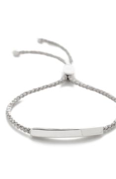 Inspired by traditional friendship bracelets, this layer-ready piece has a metallic woven cord and a slender bar crafted from precious metal. Exclusive US retailer Adjustable slide closure Can be engraved; >see locations Recycled sterling silver/textile Imported Recipient of the Butterfly Mark certification, which identifies luxury brands that adhere to social and environmental best practices This product meets Nordstrom Responsible Manufacturing criteria: made with practices that meet higher en Monica Vinader Bracelet Friendship, Adjustable Classic Jewelry For Friendship, Adjustable Silver Chain Friendship Bracelet, Adjustable Silver Chain Bracelet For Friendship, Classic Silver Adjustable Braided Bracelets, Adjustable Silver Box Chain Bracelet, Silver Adjustable Bracelets For Everyday Wear, Classic Adjustable Chain Bracelet, Everyday Silver Jewelry With Adjustable Length