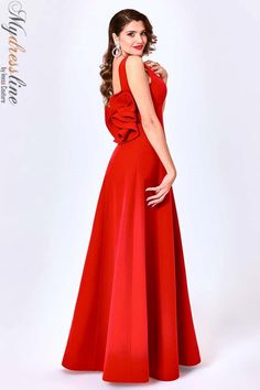 Looking for a show-stopping dress for your next special occasion? Look no further than the MNM Couture N0445 Spring 2022 evening collection dress. This gorgeous gown features a ruffled skirt and off-the-shoulder neckline, making it a truly memorable look. Whether you're attending a wedding, gala, or other formal event, this dress will have you looking your best. Elegant V-neck Ball Gown For Gala, A-line Evening Dress With Ruffles For Gala, Elegant Ruffled Ball Gown Maxi Dress, Elegant Ruffled Maxi Dress Ball Gown, Formal A-line Evening Dress With Ruffles, Elegant Maxi Length Gown With Ruffles, Elegant Maxi Gown With Ruffles, Elegant V-neck Ball Gown For Evening, Evening Gown With Ruffles And V-neck