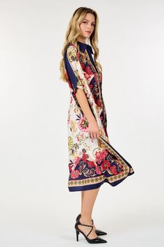 Introducing our Oversized 3/4 Sleeve Multi Print Relaxed Dress, the epitome of luxury and style. With its oversized design and eye-catching prints, this dress exudes elegance and sophistication. Perfect for any occasion, it offers comfort and effortless glamour. Elevate your wardrobe with this must-have piece. Patterned Dress With Floral Print And Kimono Sleeves, Patterned Dresses With Floral Print And Kimono Sleeves, Printed Half Sleeve Vacation Dresses, Printed Half Sleeve Dresses For Vacation, Elegant Oversized Dresses For Vacation, Chic Half Sleeve Vacation Dresses, Elegant Multicolor Dresses With Kimono Sleeves, Elegant Midi Dress With 3/4 Sleeves For Beach, Multicolor Printed Half Sleeve Dress