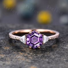 a close up of a ring on a rock