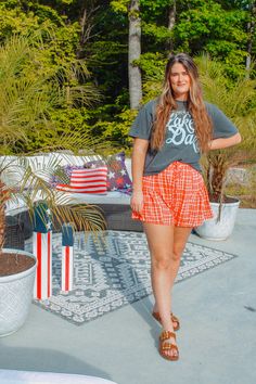 The perfect Americana shorts are here, to wear to EVERY Holiday this Spring/Summer! - Flowy short that feature a ruffle detail at the side and a red and white check print through out with a tie waist - Fit true to size - Model is in a size Medium - Fabric: 100% Polyester - Paired with our Lake Daze Crop Tee * due to screens and filters colors may vary slightly to photos * Plaid Cotton Shorts For Day Out, Plaid Shorts For Summer Day Out, Red Summer Bottoms For Picnic, Red Bottoms For Summer Picnic, Summer Plaid Shorts With Built-in Shorts, Summer Plaid Shorts For Day Out, Summer Vacation Plaid Shorts, Red Shorts For Beach On 4th Of July, Summer High-waisted Shorts For Picnic