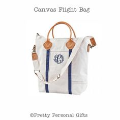 "Flight Bag - This canvas tote bag (flight bag) is great for travel and can be personalized with a name or monogram. Superior quality, heavy metal fittings and leather trim makes this bag worth every penny. Great gift for men and women alike. This listing is for one navy canvas flight bag. Pink and gray flight bags are available in other listings (scroll to bottom of listing for links) ►ABOUT THE CANVAS FLIGHT BAG -measures approximately 16\"H X 17\" W X 5.5\" D -zipper closure -1 inner zip pock Personalized Canvas Bag For Everyday Use, Personalized Tote Shoulder Bag For Travel, Canvas Tote Travel Bag For School, Personalized Tote Bags For Travel, Classic Travel Canvas Bag With Handles, Classic Canvas Travel Bag With Handles, Personalized Rectangular Canvas Travel Bag, White Canvas Travel Bag With Handles, Personalized Rectangular Travel Canvas Bag