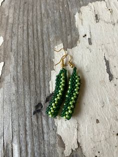 Earrings measure to be 2in they are very light earrings. Elegant Green Beaded Hoop Earrings, Elegant Green Nickel-free Clip-on Earrings, Green Adjustable Jewelry With Matching Earrings, Green Dangle Hoop Earrings As Gift, Nickel-free Green Dangle Earrings, Green Nickel Free Dangle Earrings, Green Dangle Earrings For Pierced Ears, Nickel-free Green Drop Earrings, Green Nickel-free Dangle Earrings