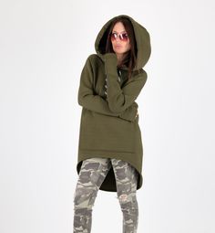 Green Hooded Sweatshirt, Asymmetrical Sweatshirt Hoodie, Winter Women Hoodie Military Green Sports Hoodie from Quilted Cotton with a large front pocket. One big front pocket. The model wears size M - 5,6' / 170 cm ►Materials & Care Made of: 100% Extra Soft Quilted Cotton Dry Cleaning, Machine Wash 30oC, Hand Wash with warm water Medium hot iron ►All of our packages are sent out with tracked delivery. Keep in mind that custom orders can't be returned. Please check our shop policies for more i Luxury Green Hooded Jacket For Winter, Luxury Green Sporty Hoodie, Cheap Green Hooded Outerwear, Cheap Sporty Hooded Sweatshirt, Cheap Green Sweatshirt With Double-lined Hood, Luxury Green Casual Hoodie, Affordable Green Hoodie With Drawstring Hood, Cheap Winter Athleisure Hoodie, Cheap Green Hooded Sweater