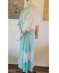 This light weight Sari dress is elegant with attention to detail from the tassels on the ties to the beaded neck. Perfect for brunch, church and wine tours! Dress is 100% polyester with 2 light weight layers making up the dress. Beaded front neckline with tassel ties around the waist and tassel ties in the back. One size fits most (0-12) Beaded neck line Tassel ties Double layer skirt Spring Beach Cover-up Dress With Tassels, Maxi Length Tassel Dress For Beach Cover-up, Maxi Length Beach Cover-up Dress With Tassels, Bohemian Tie Waist Dresses For Brunch, V-neck Beach Cover-up Dress With Tassel Ties, V-neck Tassel Tie Beach Cover-up Dress, Bohemian Maxi Dress With Tie Waist For Brunch, Long Dresses With Tassel Ties, White Tassel Maxi Dress For Vacation