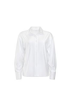 The Relaxed Ribbed Button Up is a top with a looser fit, offering a combination of comfort and elevated style. It can be worn either tucked or untucked, giving you versatile options. Made from soft, stretchy, and lightweight fabric, this button-up feels incredibly smooth on the skin. Its glossy finish adds a touch of sophistication, making it suitable for dressing up. Additionally, the relaxed fit ensures all-day comfort, so you can feel at ease no matter how long you wear it. Made with Renew Fo Versatile Button-up Tops For Layering, Versatile Everyday Tops With Button Cuffs, Classic Blouse With Button Cuffs For Layering, Classic Button-up Blouse For Layering, Oversized Buttoned Tops For Layering, Oversized Button-down Tops For Layering, Chic Everyday Tops With Button Cuffs, Versatile Tops With Button Closure For Layering, Classic Tops With Buttons For Layering