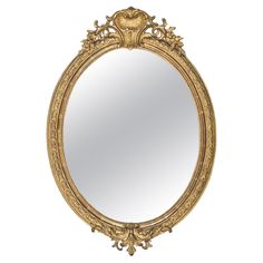 an ornate gold framed mirror against a white background