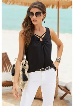 Add a dash of sophistication and effortless style to your wardrobe with this unique top. Chic Sleeveless Blouse, Elegant Sleeveless Blouse For Beach, Elegant Stretch Tops For Vacation, Elegant Stretch Tank Top For Vacation, Chic Stretch Tops For Vacation, Elegant Black Summer Blouse, Trendy Black Sleeveless Blouse Top, Black Summer Tops For Work, Black Summer Tops For Workwear